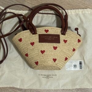 Sezane Justine mini basket with embroidered hearts.